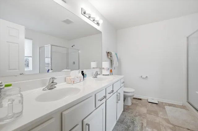 a bathroom with a sink a vanity and a mirror