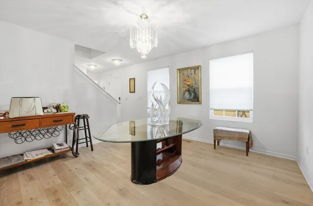 a view of a room with furniture window and wooden floor