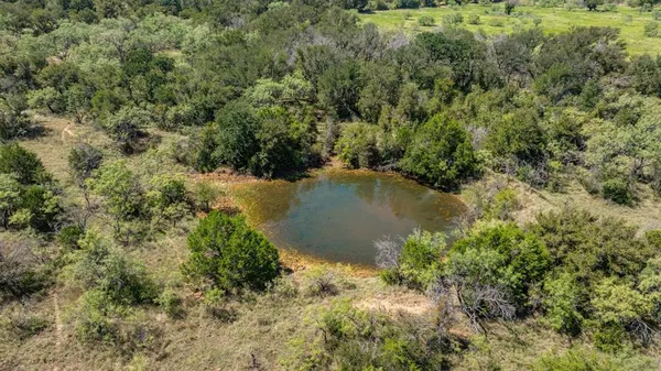 a view of a lake with a house