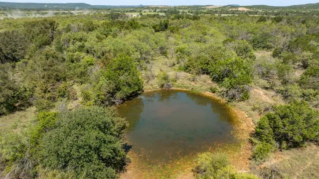 a view of a lake with mountains in the background
