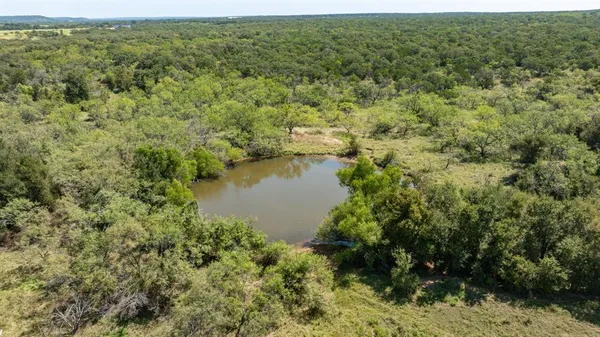 a view of a lake with an outdoor space