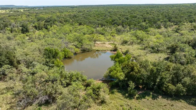 a view of a lake with an outdoor space