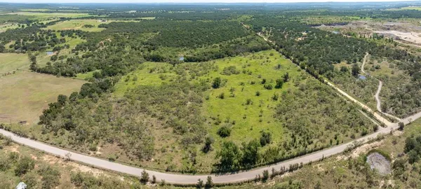 a view of a forest from a balcony