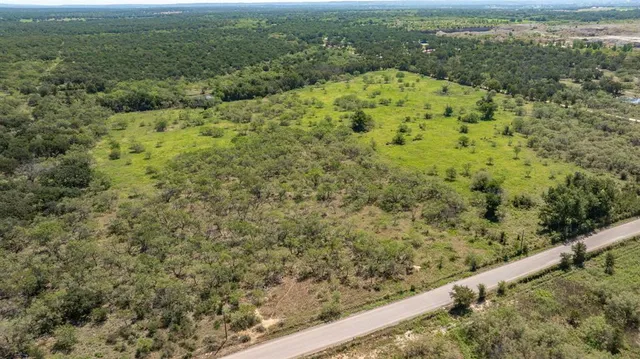 a view of a yard with an outdoor space