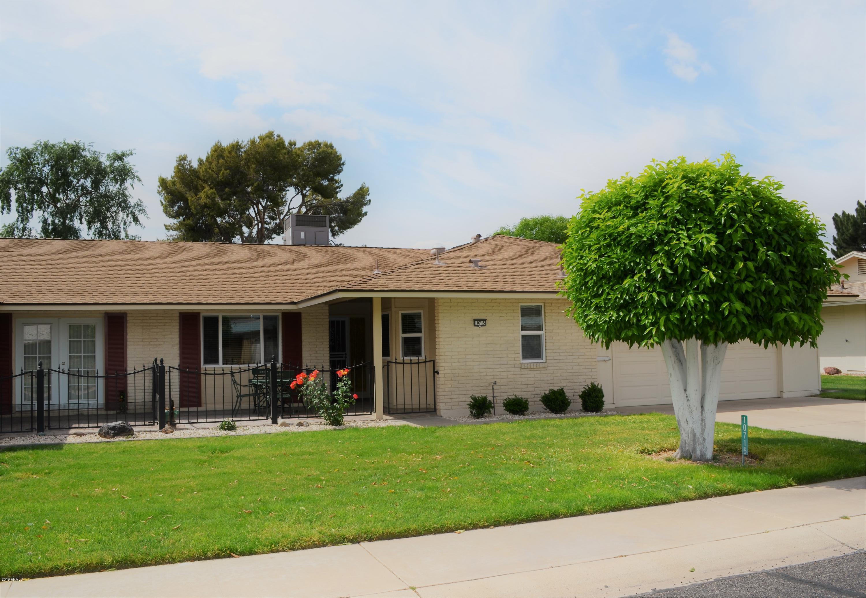 10715 West Hatcher Road Sun City, AZ 85351 - Photo 1 of 35 1 Front View