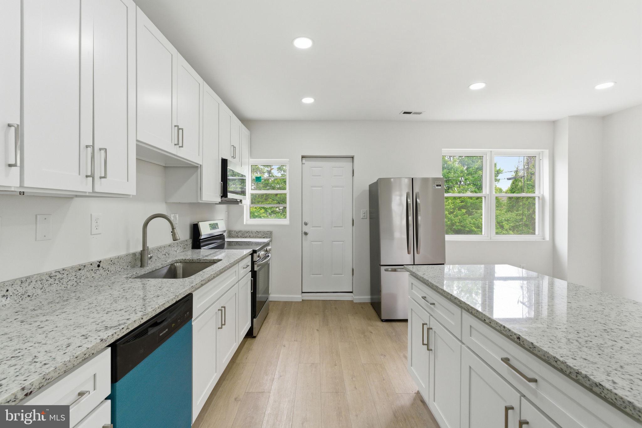 4111 Roland View Avenue Baltimore, MD 21215 - Photo 4 of 19 Modern kitchen with sleek finishes.