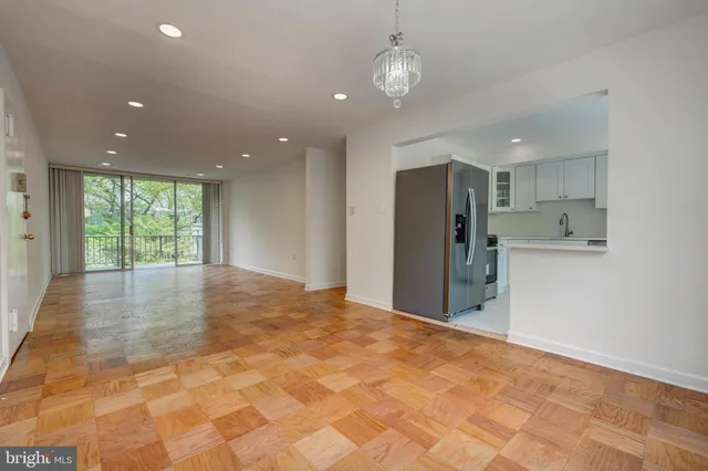 a view of an empty room with a stove
