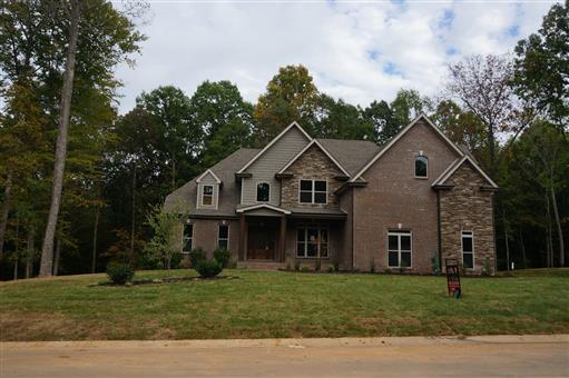 3 Old Clarksville Springfield Road Adams, TN 37010 - Photo 1 of 27 a front view of a house with a garden