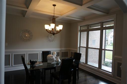 3 Old Clarksville Springfield Road Adams, TN 37010 - Photo 13 of 27 a view of a dining room with furniture a chandelier and large windows