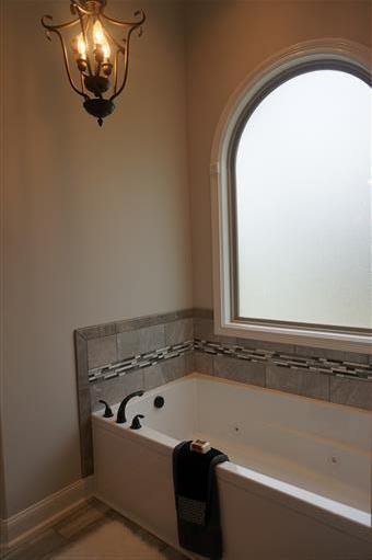 3 Old Clarksville Springfield Road Adams, TN 37010 - Photo 15 of 27 a bathroom with a tub and sink