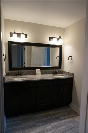 3 Old Clarksville Springfield Road Adams, TN 37010 - Photo 20 of 27 a bathroom with a sink and a mirror