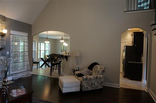 3 Old Clarksville Springfield Road Adams, TN 37010 - Photo 2 of 27 a living room with furniture and a chandelier