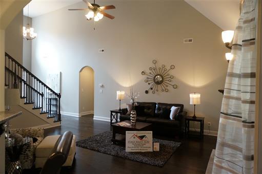 3 Old Clarksville Springfield Road Adams, TN 37010 - Photo 3 of 27 a living room with furniture a chandelier and a dining room
