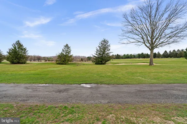 a view of a lake with a big yard