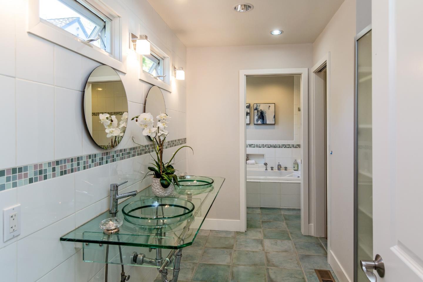 576 Bush Street Mountain View, CA 94041 - Photo 11 of 21 a dining room with furniture and a mirror