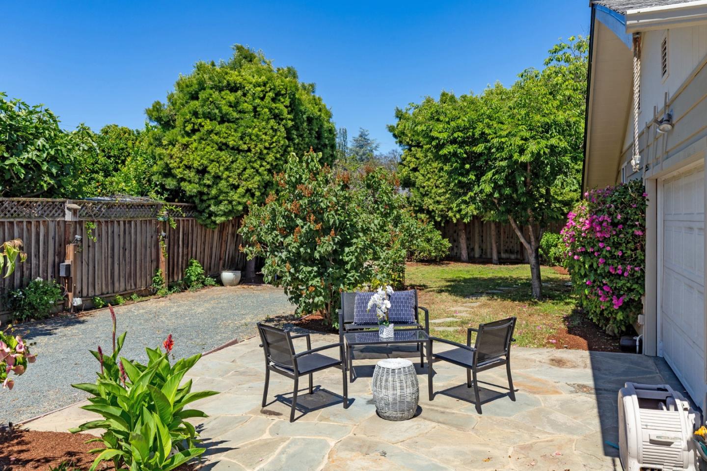 576 Bush Street Mountain View, CA 94041 - Photo 19 of 21 a view of a backyard with furniture and a patio