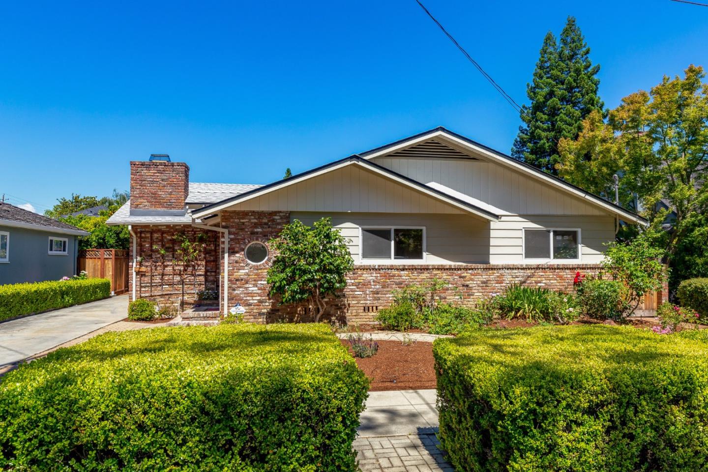 576 Bush Street Mountain View, CA 94041 - Photo 21 of 21 a front view of house with yard and green space