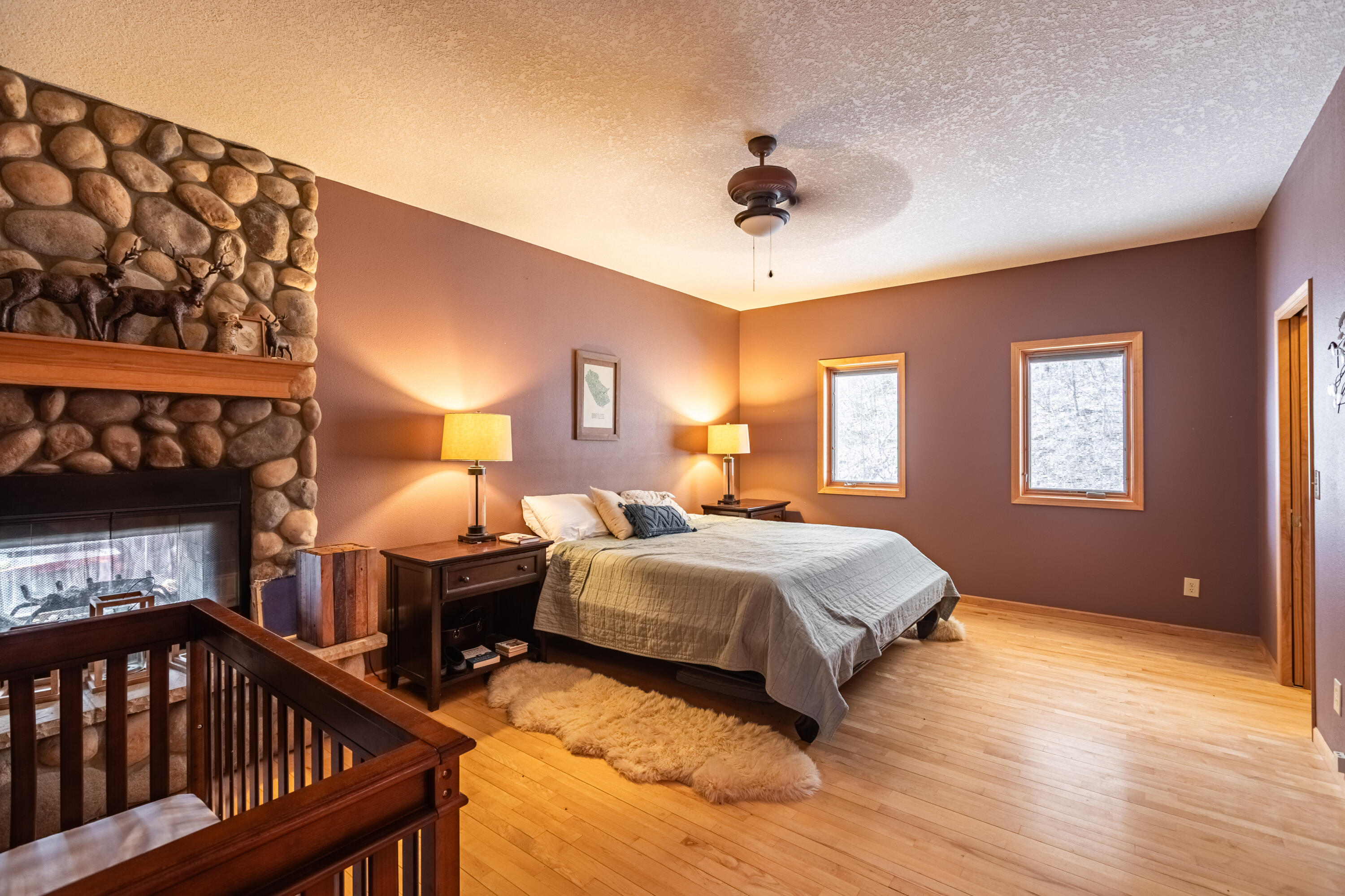 10235 Tavern Road Clayton, WI 54655 - Photo 10 of 30 w/ two way stone fireplace