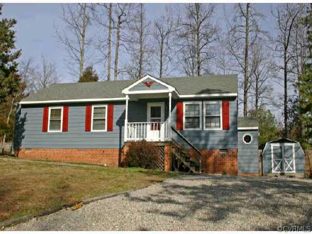 12412 South Ridge Terrace Midlothian, VA 23112 - Photo 1 of 1 a front view of a house with a yard