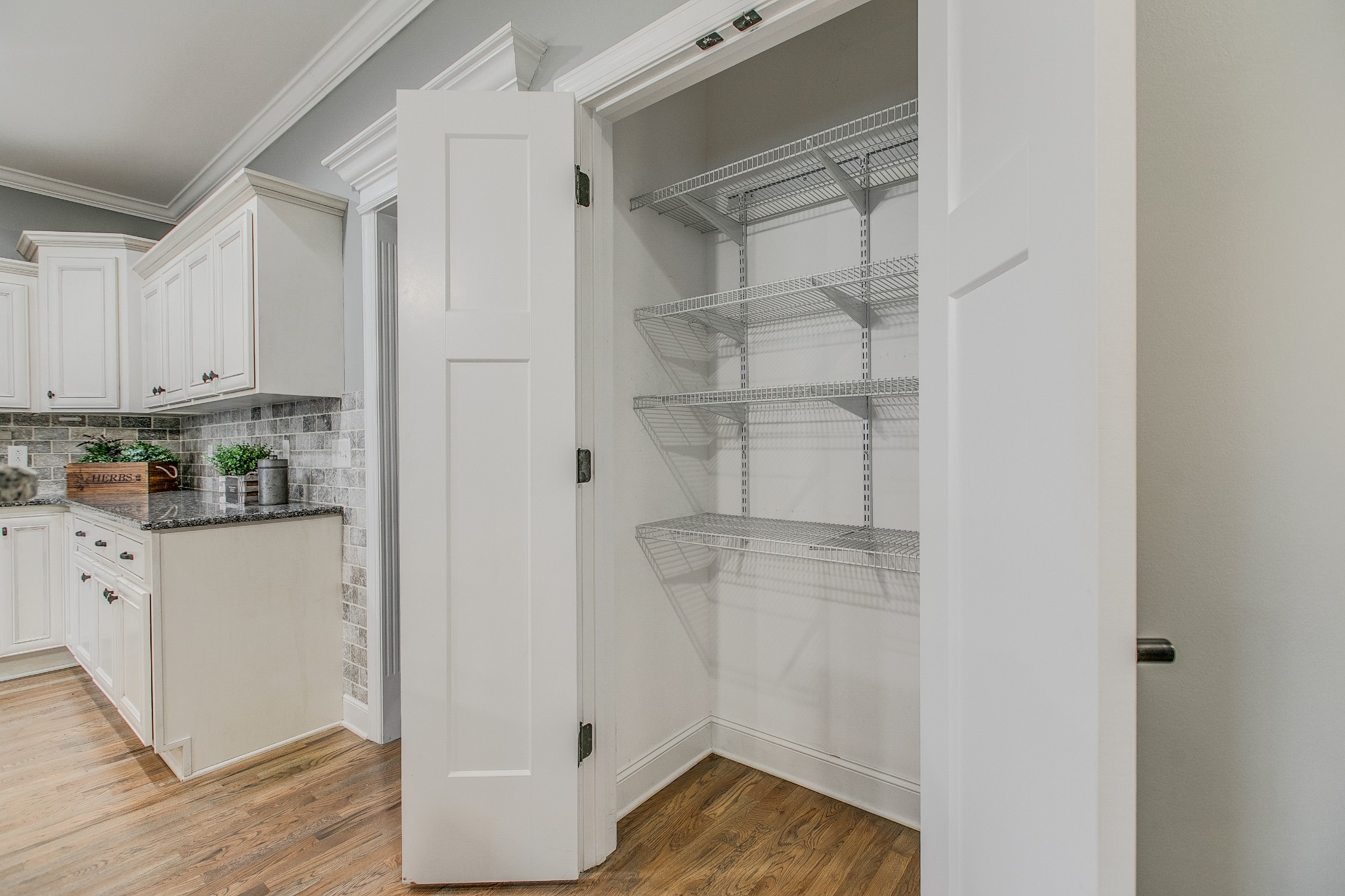 1102 Cascadeway Drive Murfreesboro, TN 37129 - Photo 20 of 45 a view of walk in closet with wooden floor