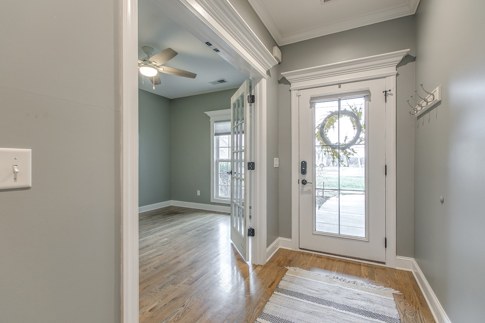 1102 Cascadeway Drive Murfreesboro, TN 37129 - Photo 3 of 45 an empty room with wooden floor and a window
