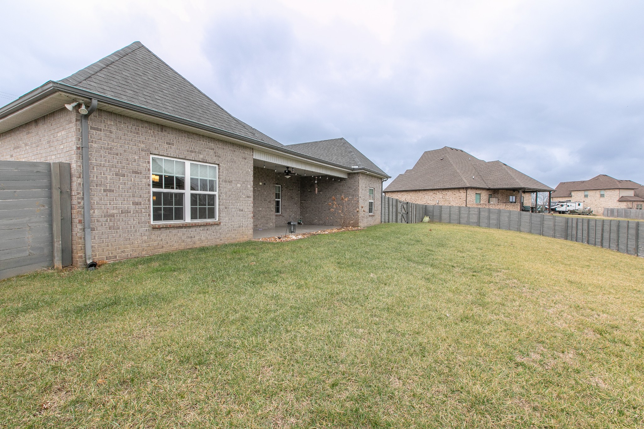 1102 Cascadeway Drive Murfreesboro, TN 37129 - Photo 38 of 45 a view of a house with a yard and garage
