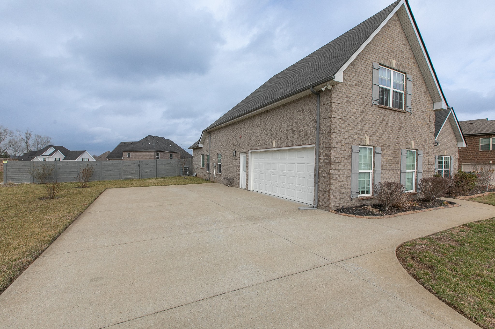 1102 Cascadeway Drive Murfreesboro, TN 37129 - Photo 43 of 45 a view of a house with a yard