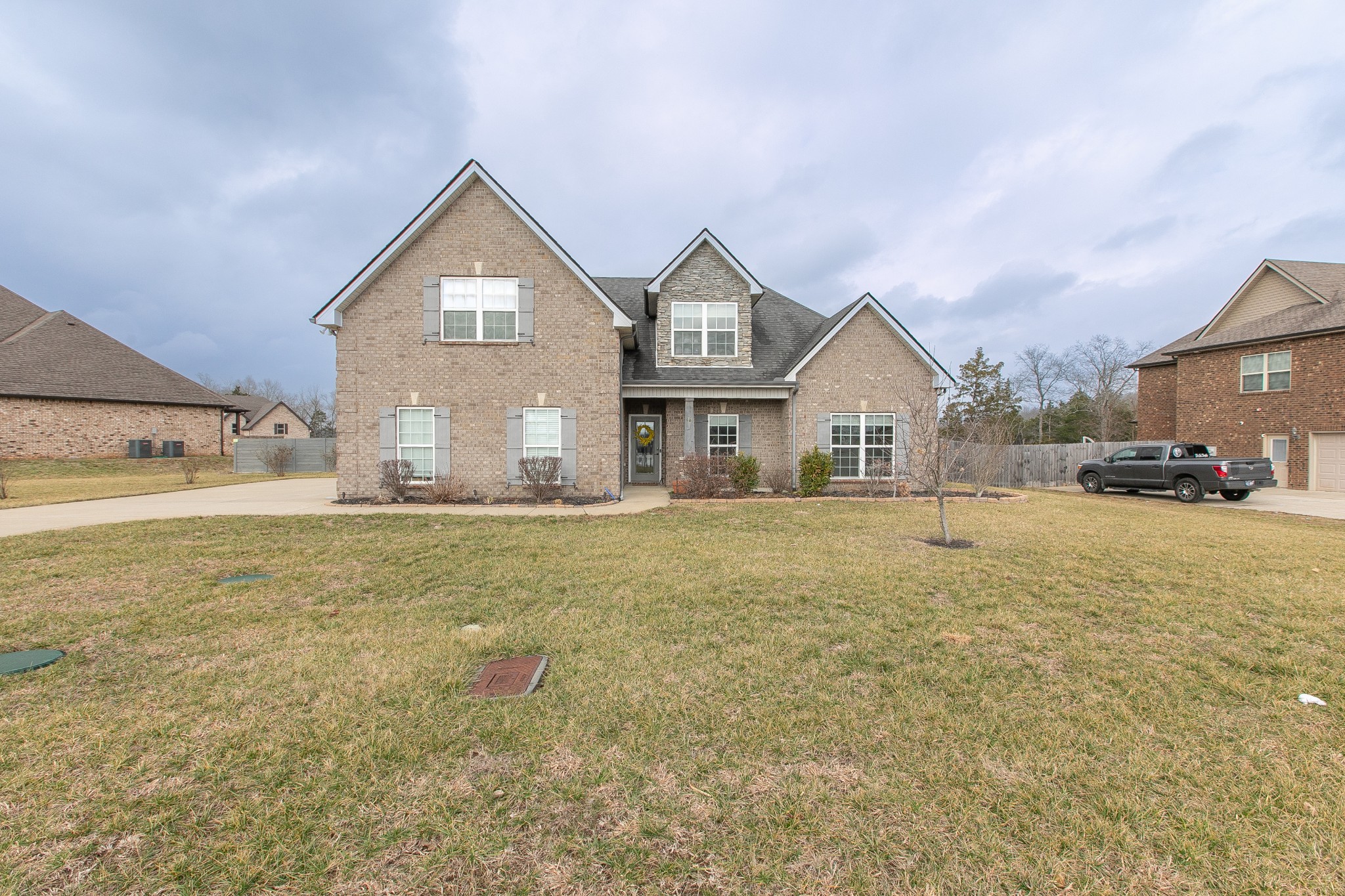1102 Cascadeway Drive Murfreesboro, TN 37129 - Photo 45 of 45 a view of a house next to a big yard with large trees
