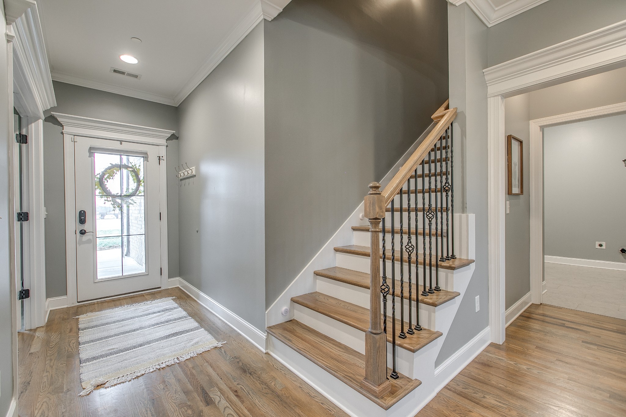 1102 Cascadeway Drive Murfreesboro, TN 37129 - Photo 6 of 45 a view of entryway and hall with wooden floor