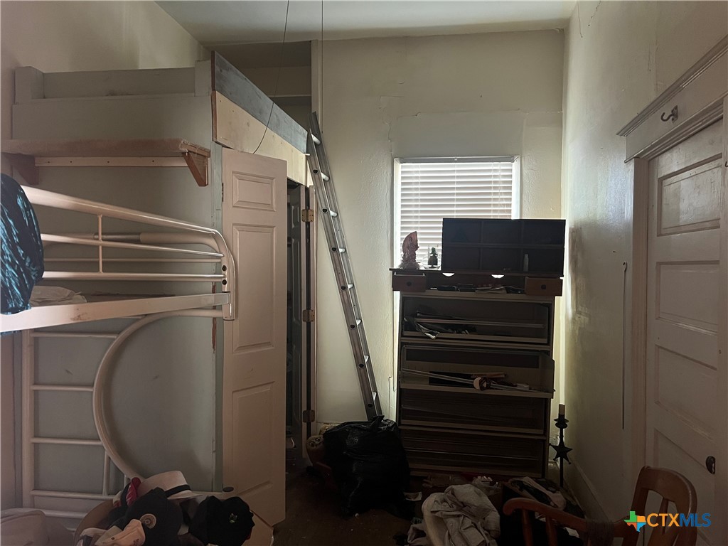 612 South 7th Street Temple, TX 76504 - Photo 13 of 43 a view of closet with wooden floor