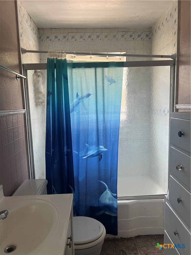 612 South 7th Street Temple, TX 76504 - Photo 23 of 43 a bathroom with a shower and a toilet