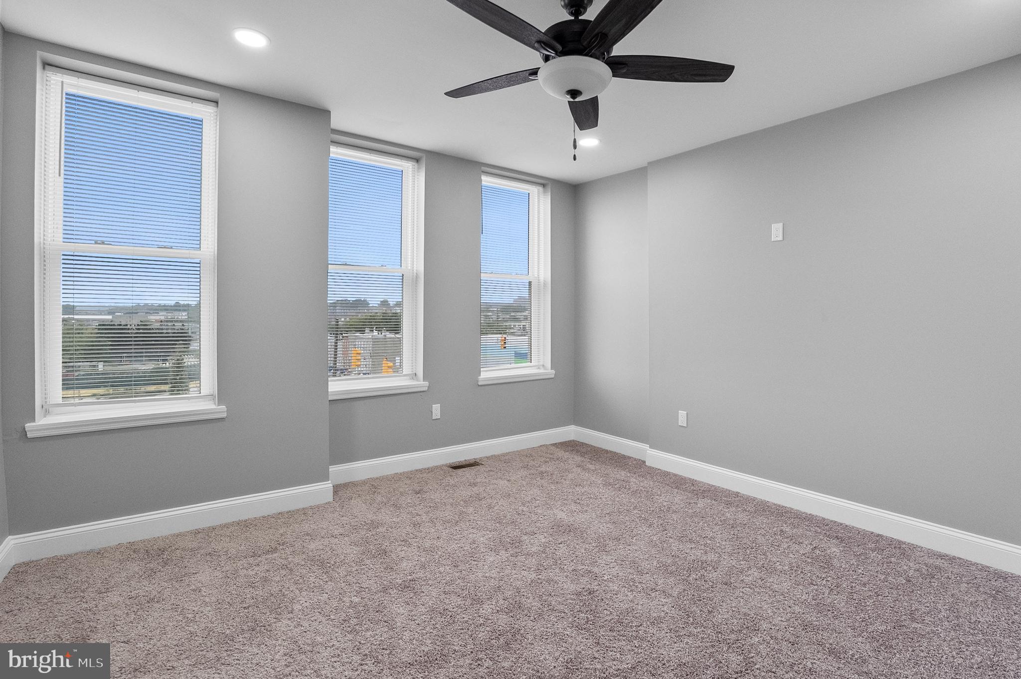 1201 North Fulton Avenue Baltimore, MD 21217 - Photo 25 of 36 a view of an empty room with a window
