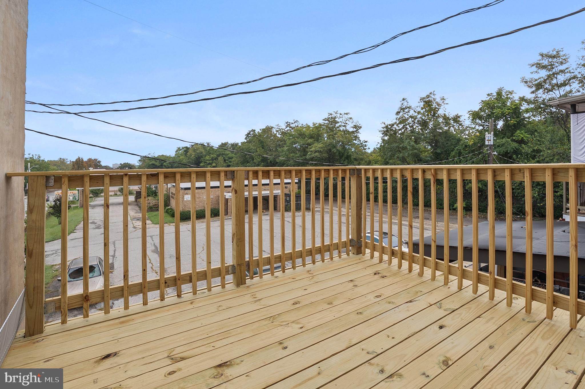 1201 North Fulton Avenue Baltimore, MD 21217 - Photo 32 of 36 a view of a balcony with wooden floor