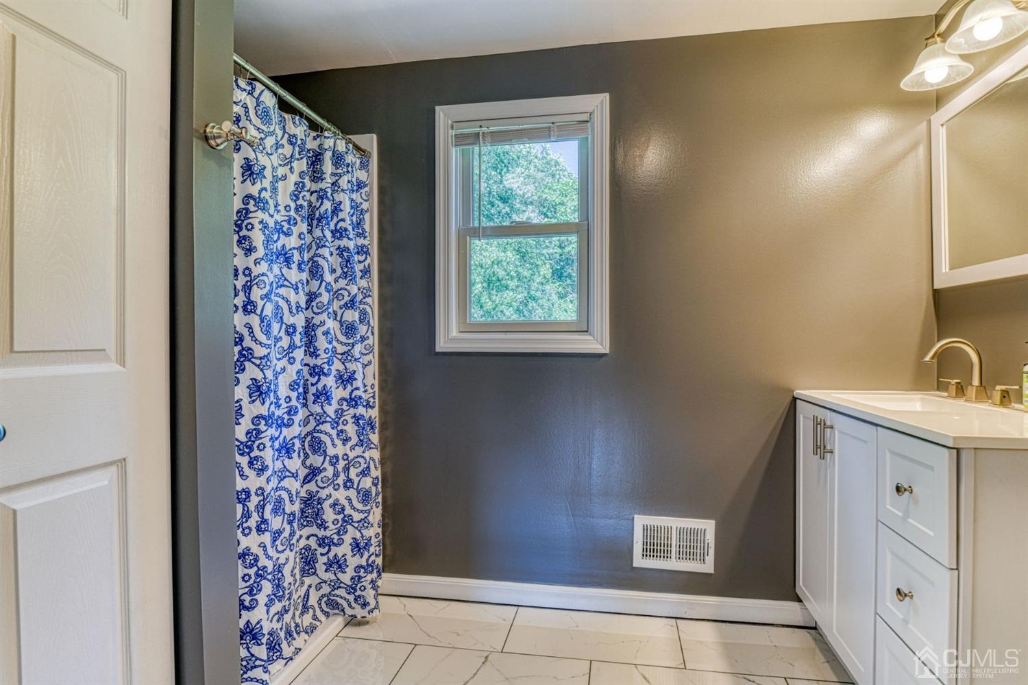 18 Mimi Road Old Bridge, NJ 08857 - Photo 24 of 33 Brand new bath with beautiful tile, vanity, shower and closet!
