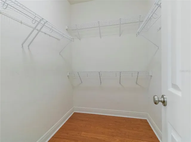 a view of a room with racks on the wall