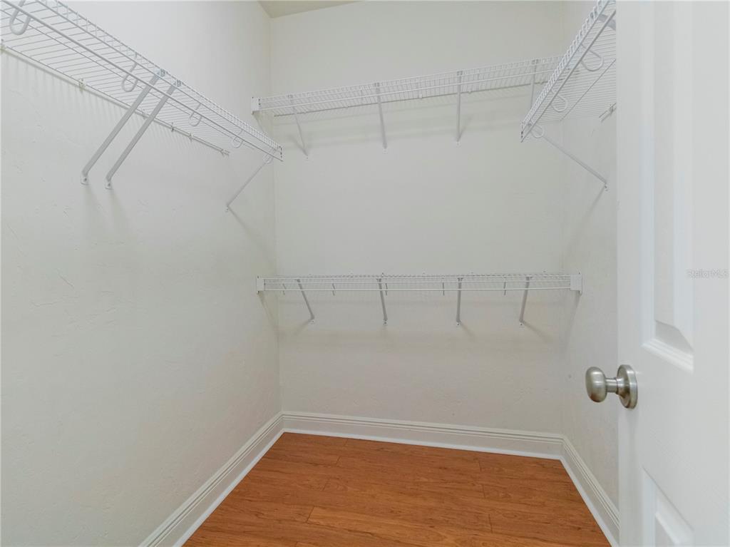 14001 Northwest 9th Road Newberry, FL 32669 - Photo 12 of 17 a view of a room with racks on the wall