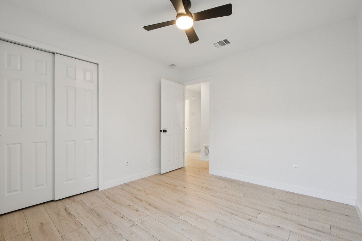 17921 Basket Flower Bend Elgin, TX 78621 - Photo 26 of 40 a view of an empty room with wooden floor