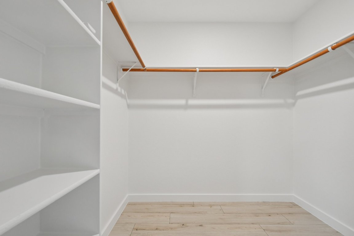 17921 Basket Flower Bend Elgin, TX 78621 - Photo 37 of 40 a view of an empty walk in closet