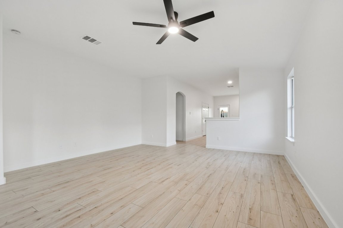 17921 Basket Flower Bend Elgin, TX 78621 - Photo 10 of 40 a view of empty room with wooden floor