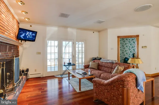 a kitchen with appliances a sink and cabinets