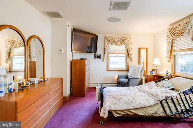 a view of a room with furniture