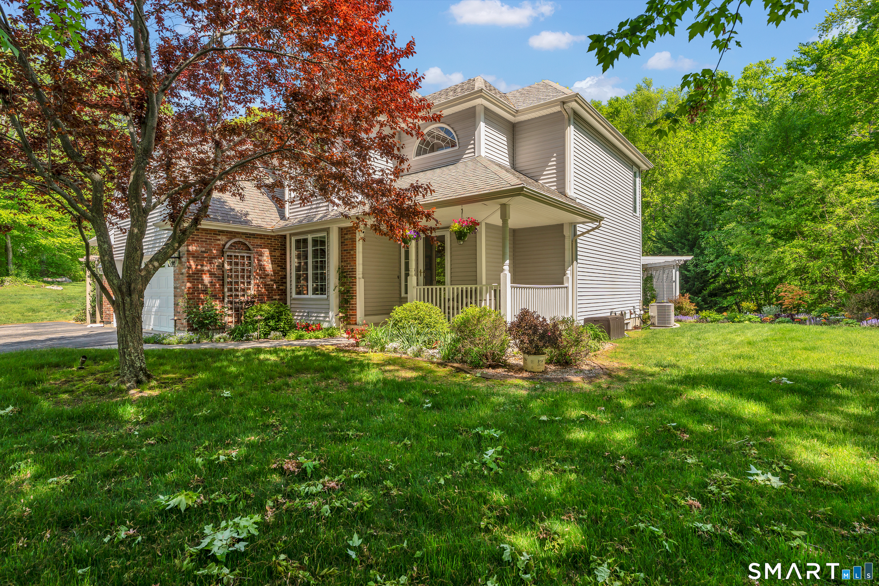 21 Stone Wall Road Salem, CT 06420 - Photo 1 of 38 a front view of house with yard and green space