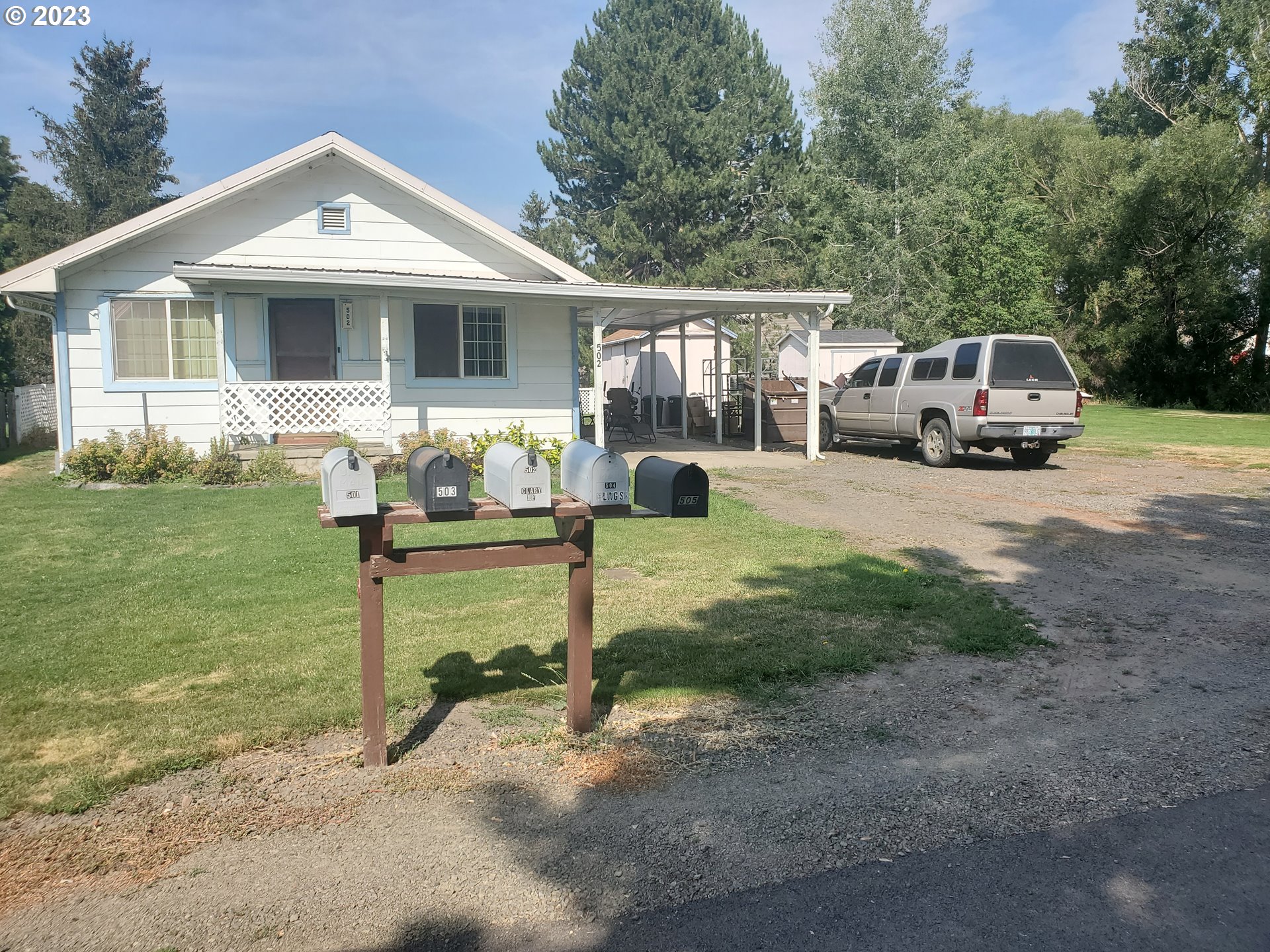 502 Southeast Evans Lane Enterprise, OR 97828 - Photo 11 of 18 a front view of a house with garden