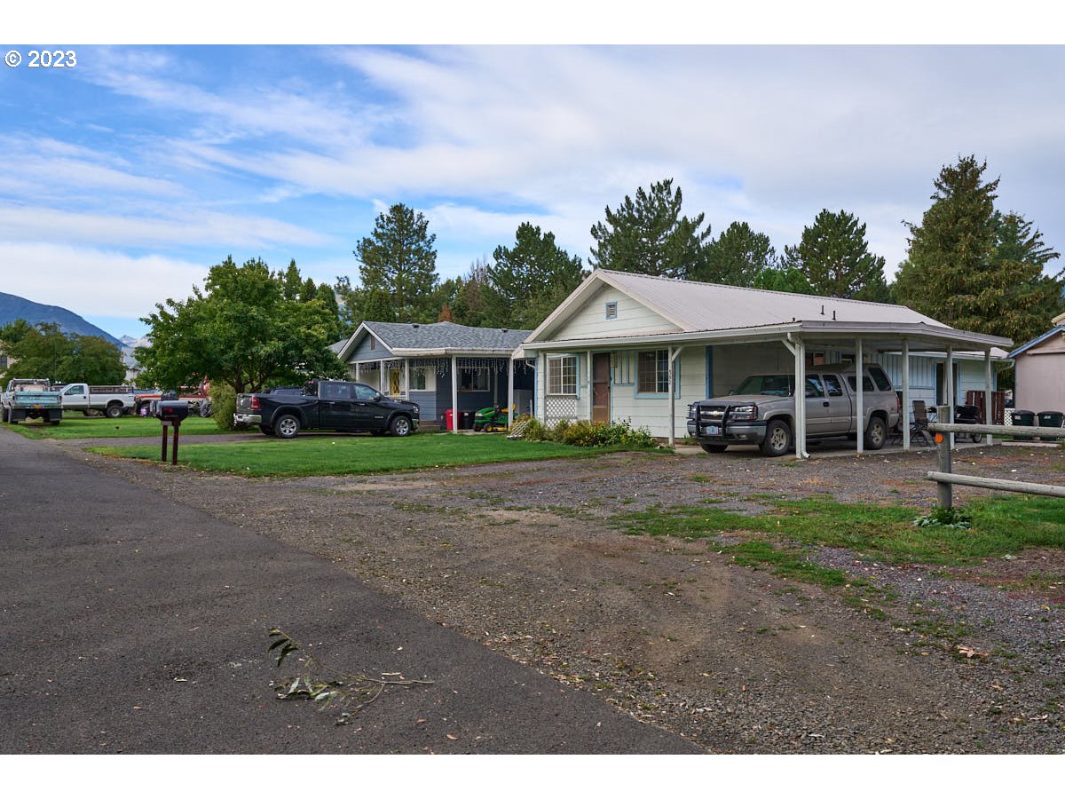 502 Southeast Evans Lane Enterprise, OR 97828 - Photo 15 of 18 a front view of a house with a yard