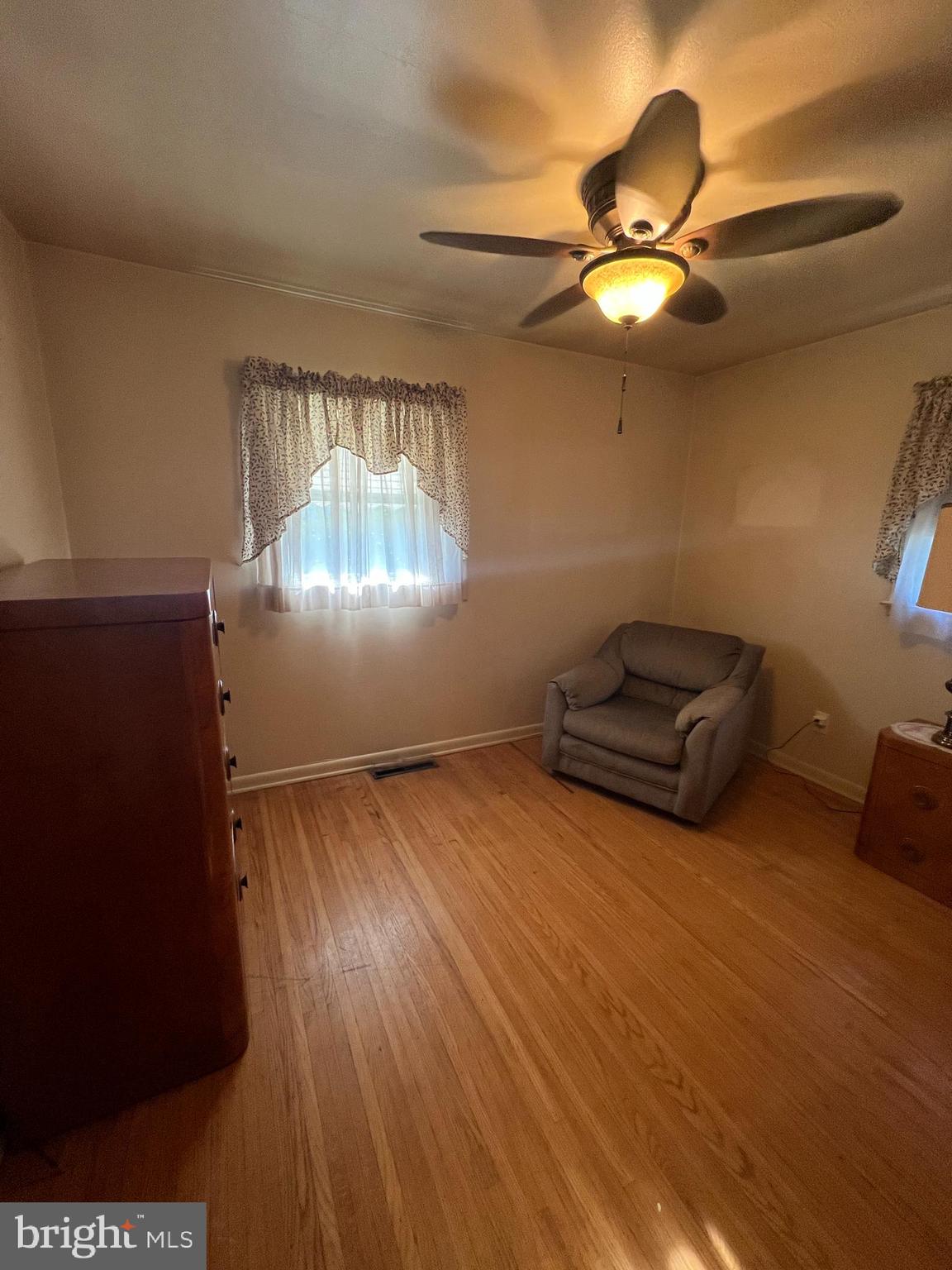 301 Murray Avenue Bellmawr, NJ 08031 - Photo 12 of 36 a living room with furniture and a chandelier
