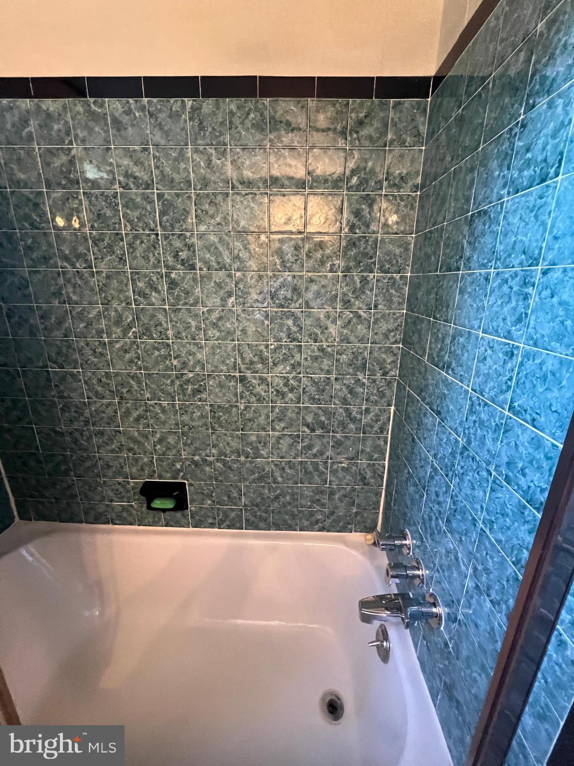 301 Murray Avenue Bellmawr, NJ 08031 - Photo 19 of 36 a bathroom with a bathtub