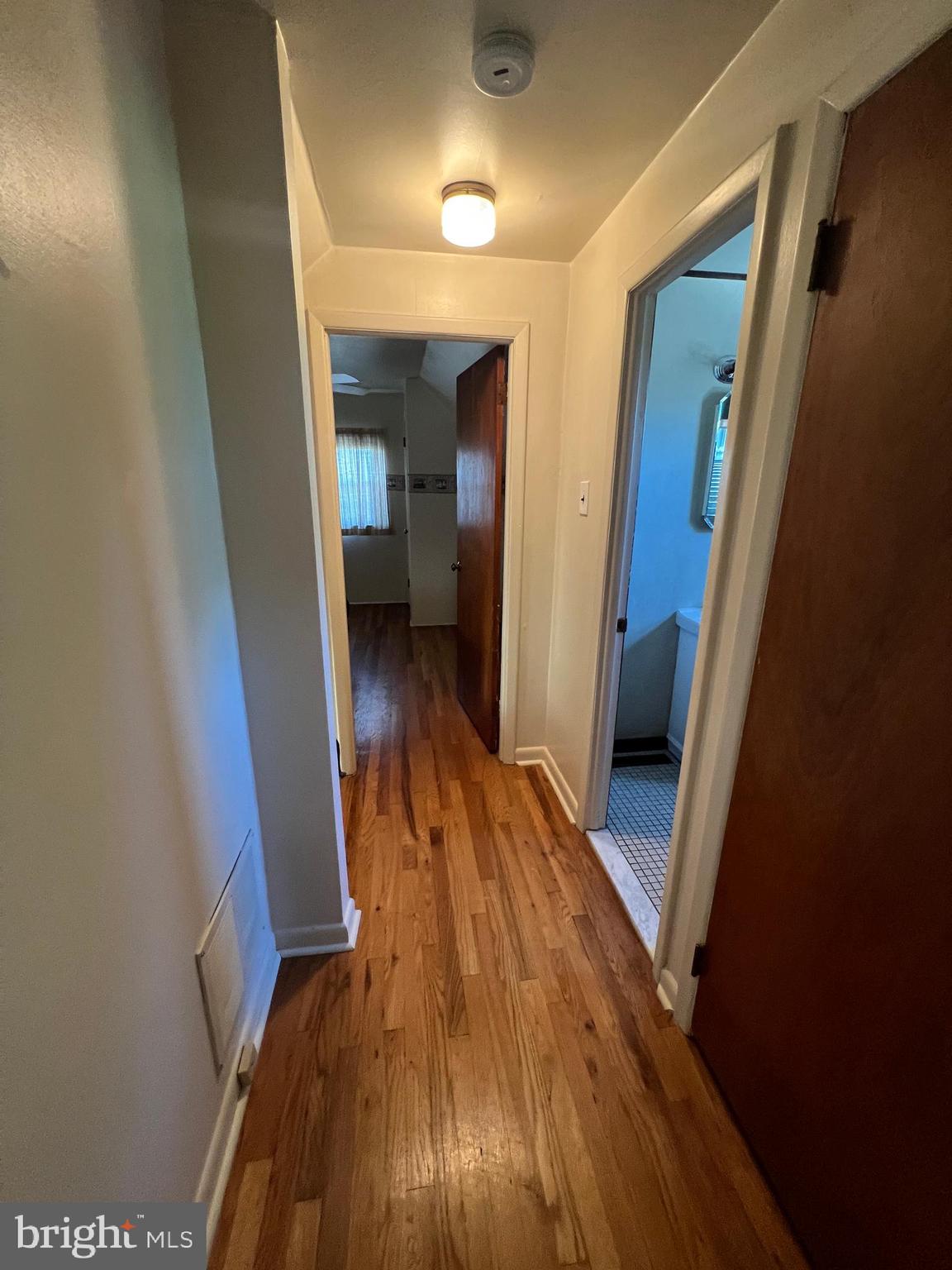 301 Murray Avenue Bellmawr, NJ 08031 - Photo 20 of 36 a view of a hallway view with wooden floor and staircase