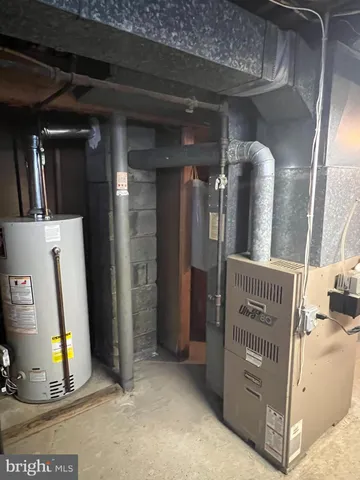 a view of a hallway with a living room