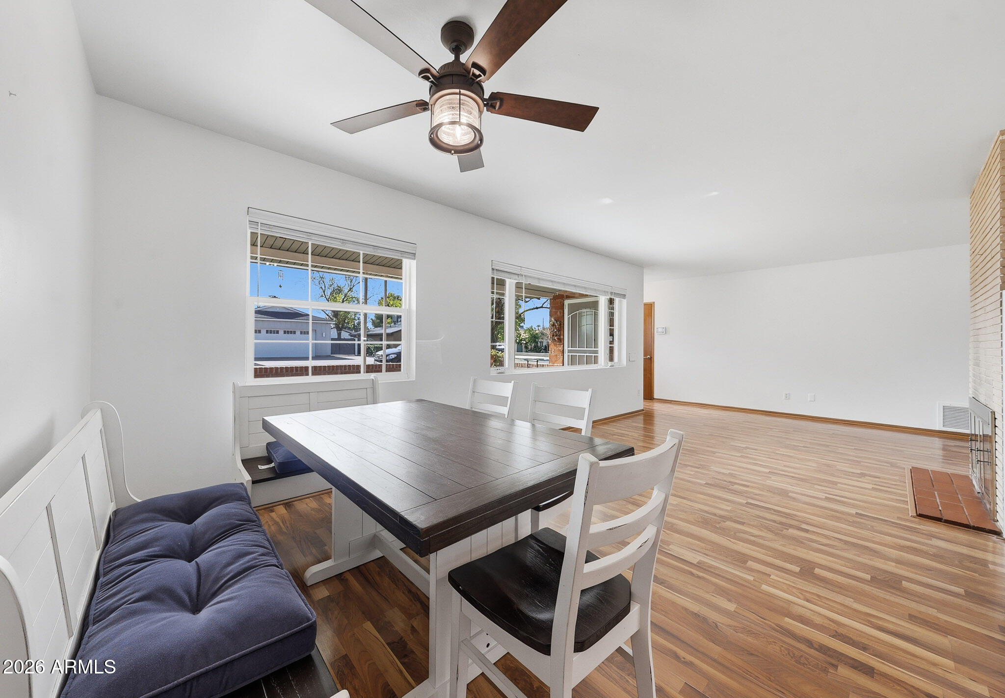 4108 East Edgemont Avenue Phoenix, AZ 85018 - Photo 19 of 118 a view of a livingroom with furniture and wooden floor