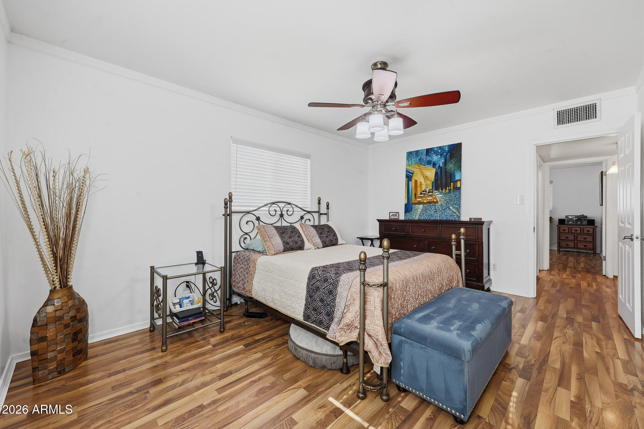 4108 East Edgemont Avenue Phoenix, AZ 85018 - Photo 41 of 118 a bedroom with furniture and a chandelier
